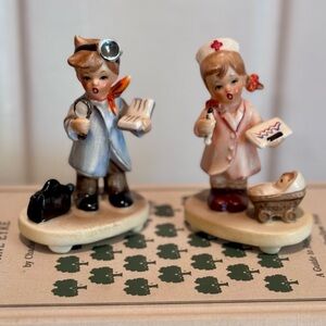 Vintage doctor and nurse figurines. Small. Children and a baby